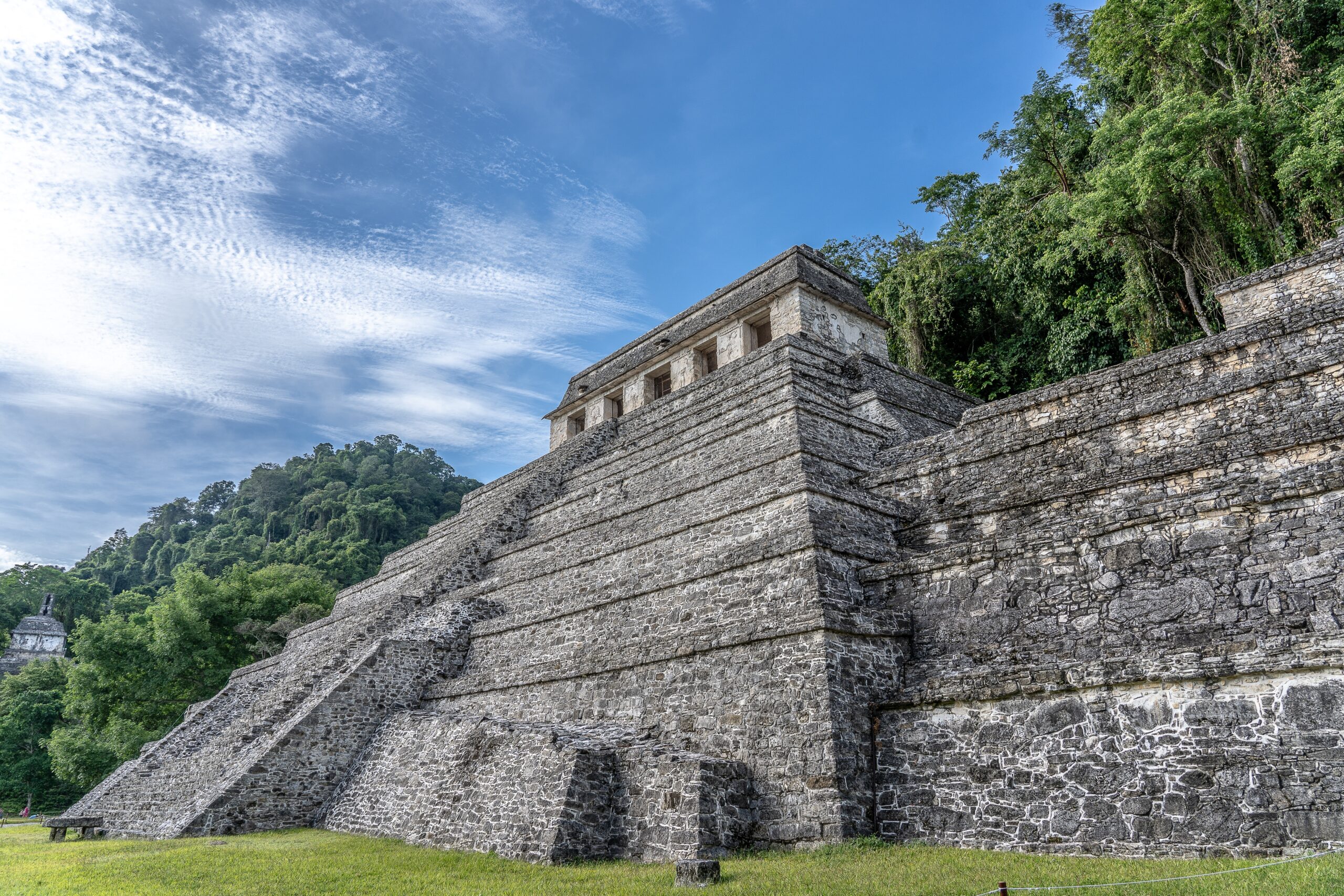 Low angle shot of the Temple of the Inscriptions Palenque in Mexico under a clear blue sky
